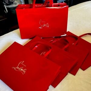 7 never used shopping bags from Christian Louboutin